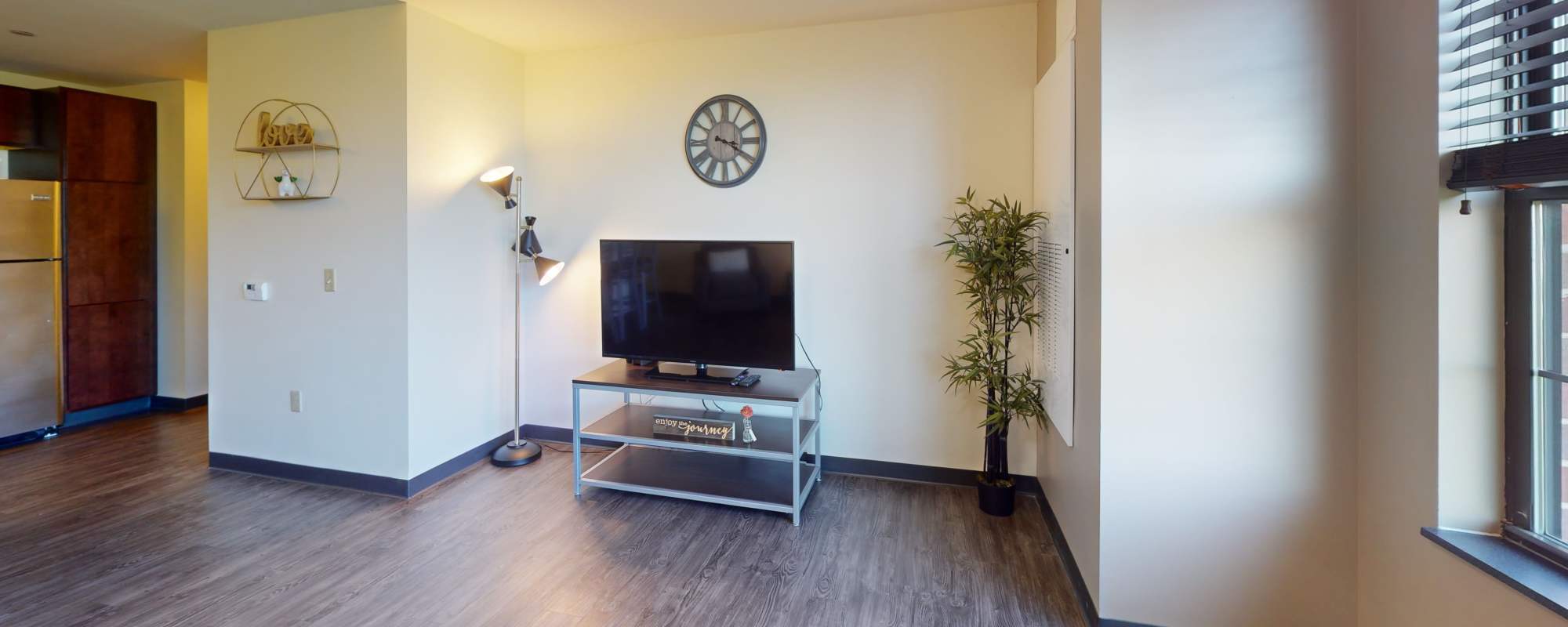 Television in the spacious living area at Hudson Lofts in Erie, Pennsylvania