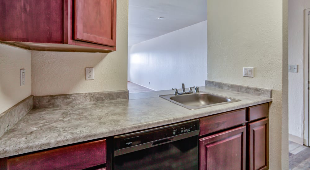 Model kitchen with granite counters at Piedmont in Oakland, California