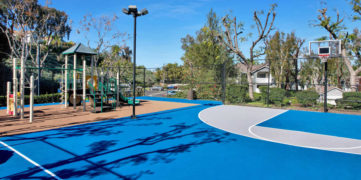 Basketball court and playground at Village Oaks in Chino Hills, California