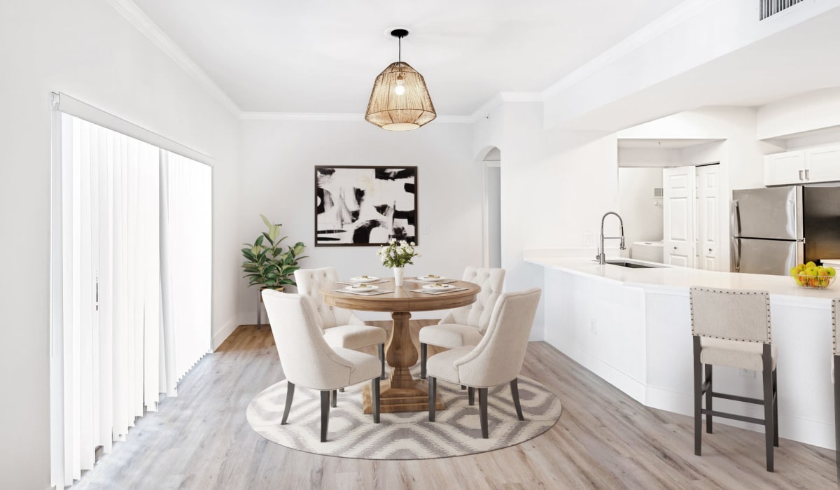 Dining area with table at The Estates at Wellington Green Apartments, Wellington, Florida