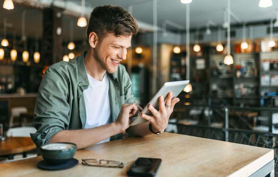 Resident working outside on his pad near UCE Apartment Homes in Fullerton, California