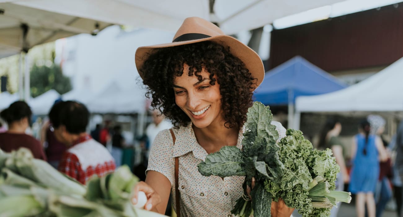 Resident shopping for produce in Allentown, Pennsylvania near Penn Crest Apartments