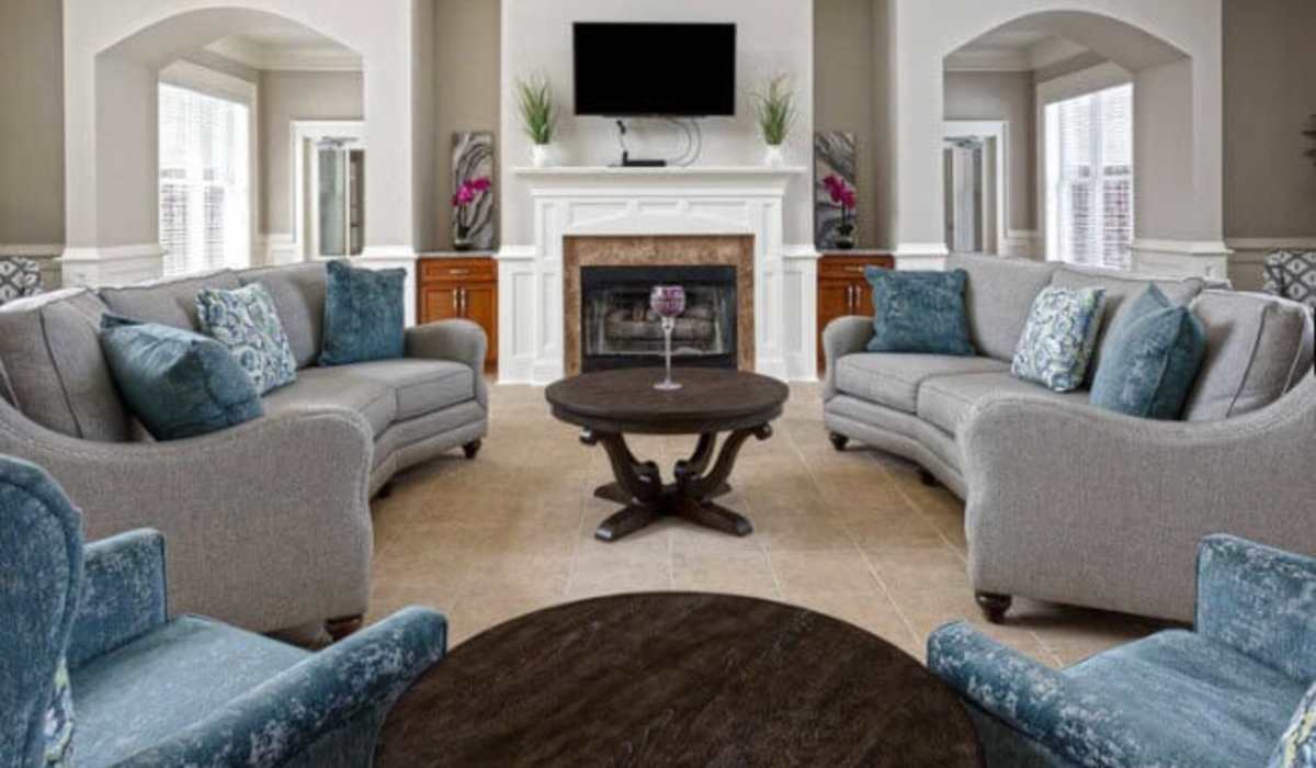 Community space with fireplace at Palisades at Legacy Oaks in Knightdale, North Carolina