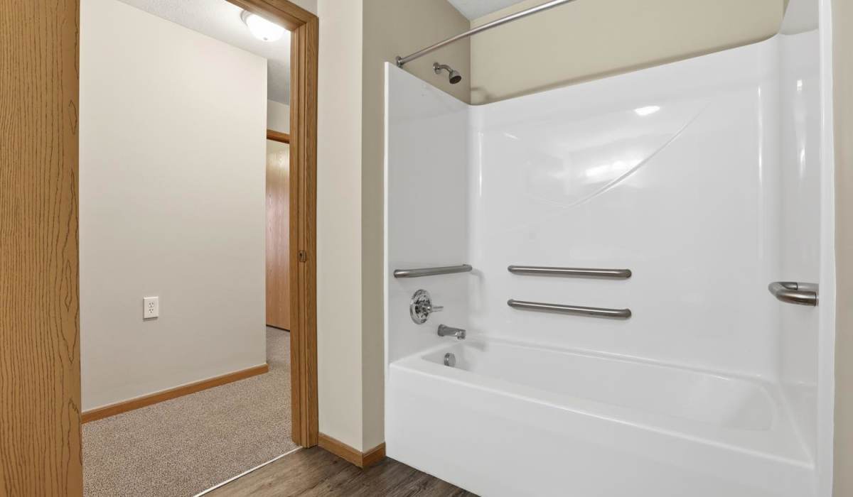 A spacious walk-in shower at Norwood Greene Senior Living in Marietta, Ohio