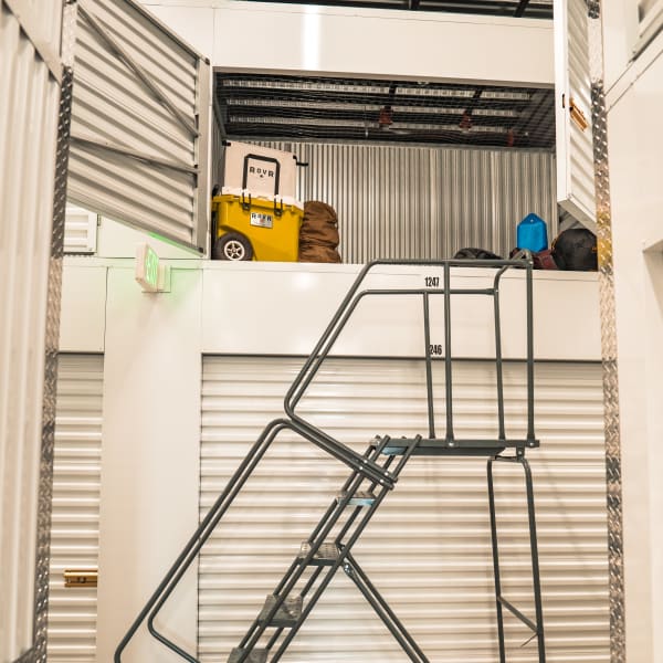 A ladder makes accessing storage lockers easy.