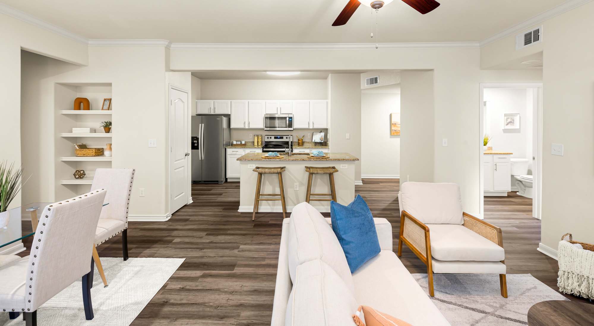 Living room with view of kitchen at Onion Creek