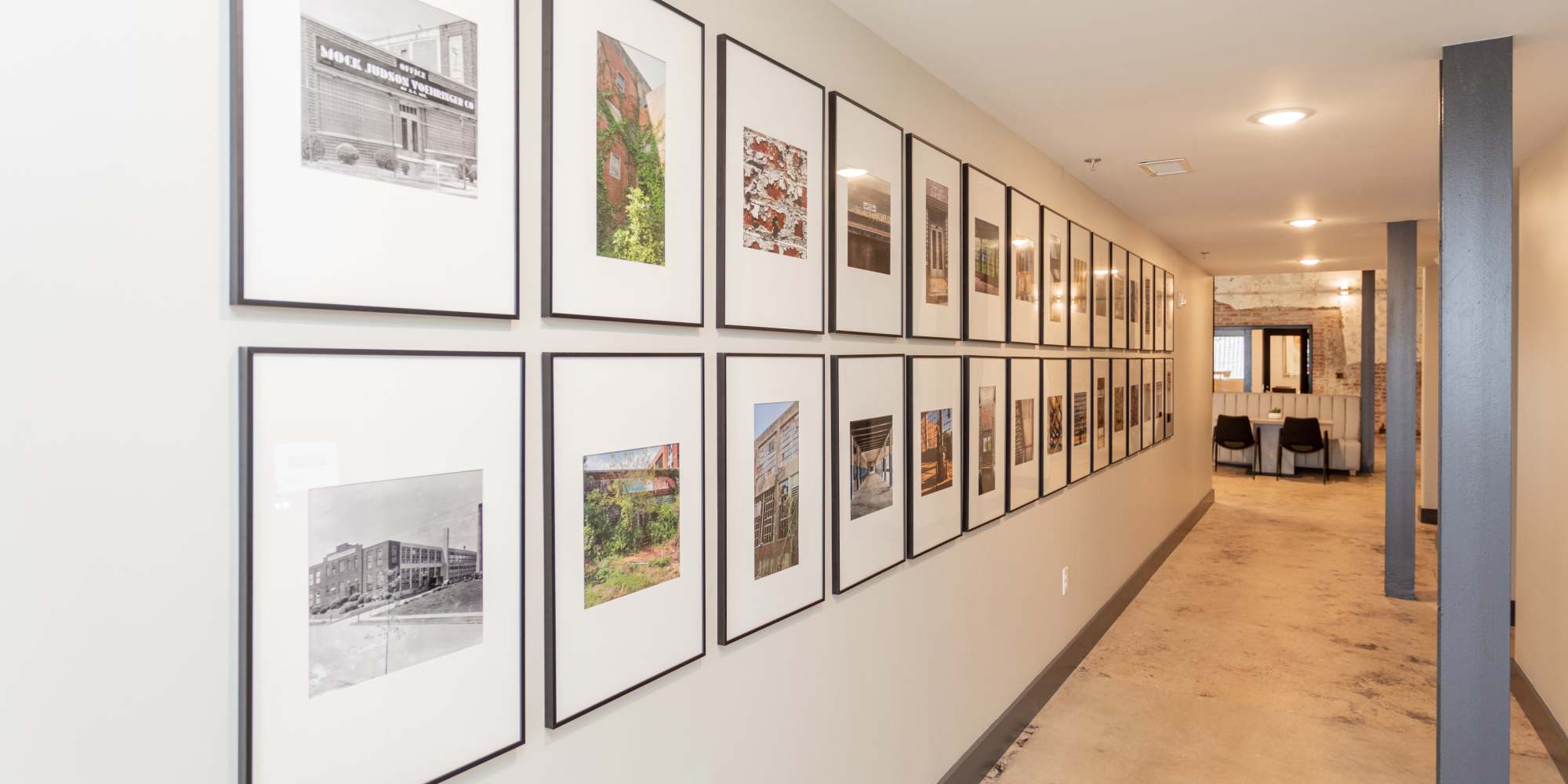 Hallway with arts on the wall at Mojud Lofts in Greensboro, North Carolina