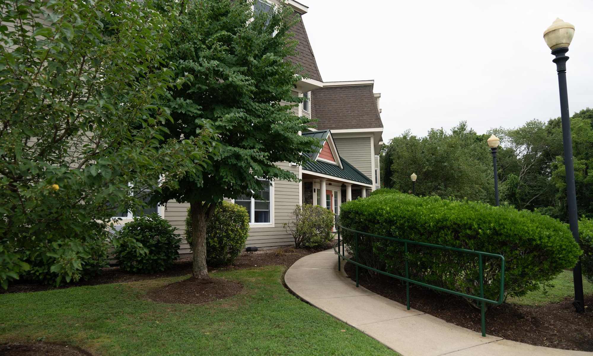 View of apartment exterior at Edgewater Apartments in Westport, Massachusetts