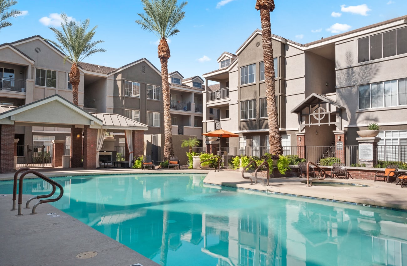 Luxurious pool with lounge seating at Citi on Camelback in Phoenix, Arizona