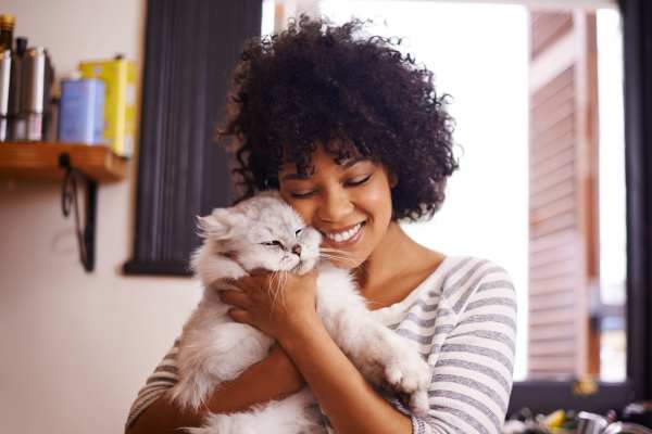 Resident with her cat at Avonlea Westside in Atlanta, Georgia