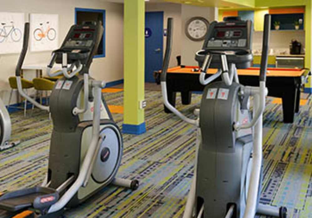 Fitness center at UCE Apartment Homes in Fullerton, California