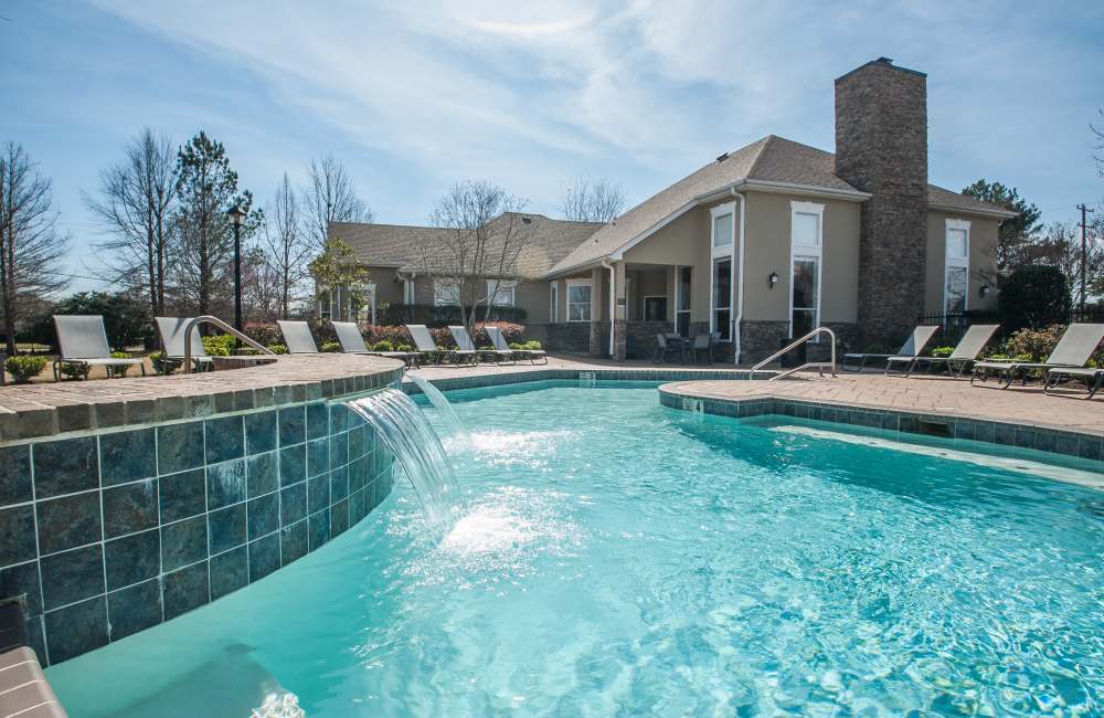 Large shimmering swimming pool for the community at Waterford Place Apartment Homes in Memphis, Tennessee