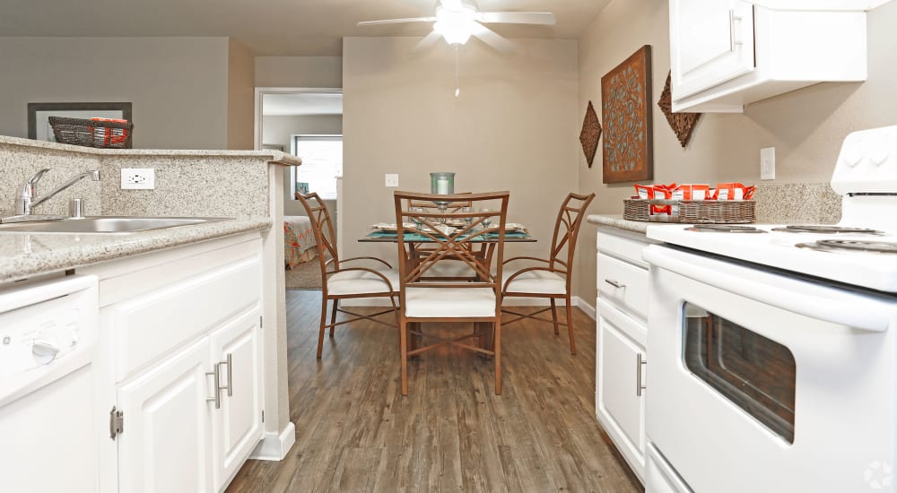 Kitchen with wood-style flooring at Greenback Ridge in Citrus Heights, California