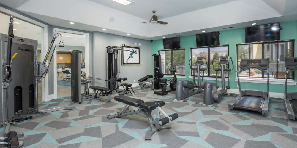 Fitness center with various equipment at One Belmar Place in Lakewood,Colorado