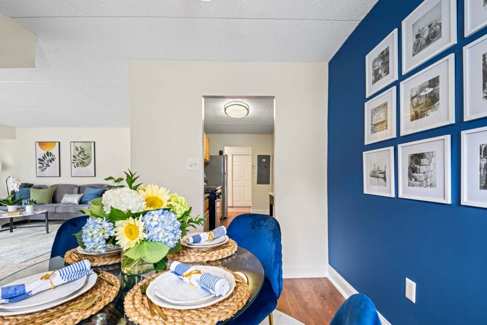 Dining area with a table and chairs at Windsor Court and Tower in Silver Spring, Maryland