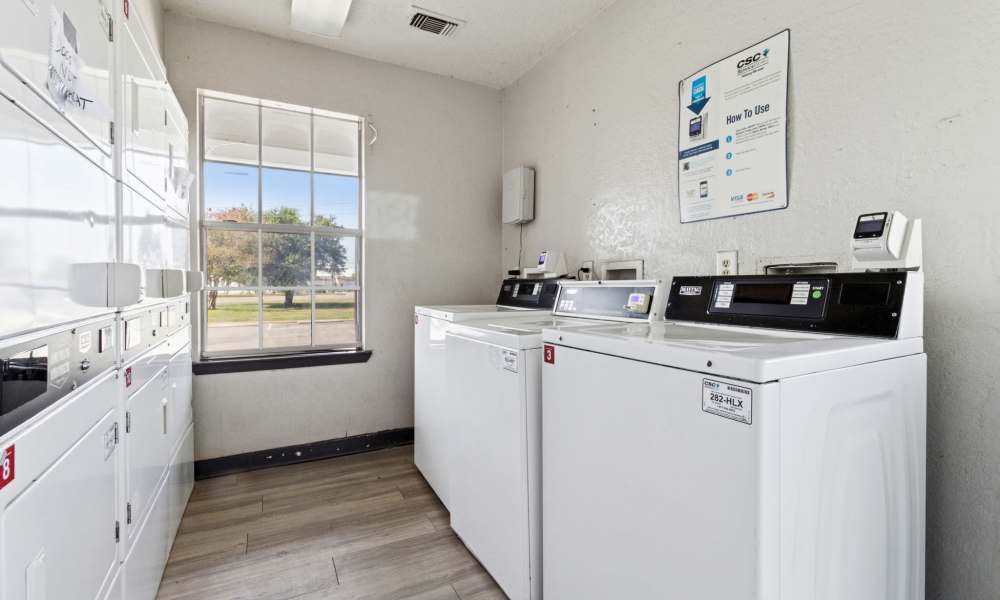 Community laundry area at Arbors of Taylor in Taylor, Texas
