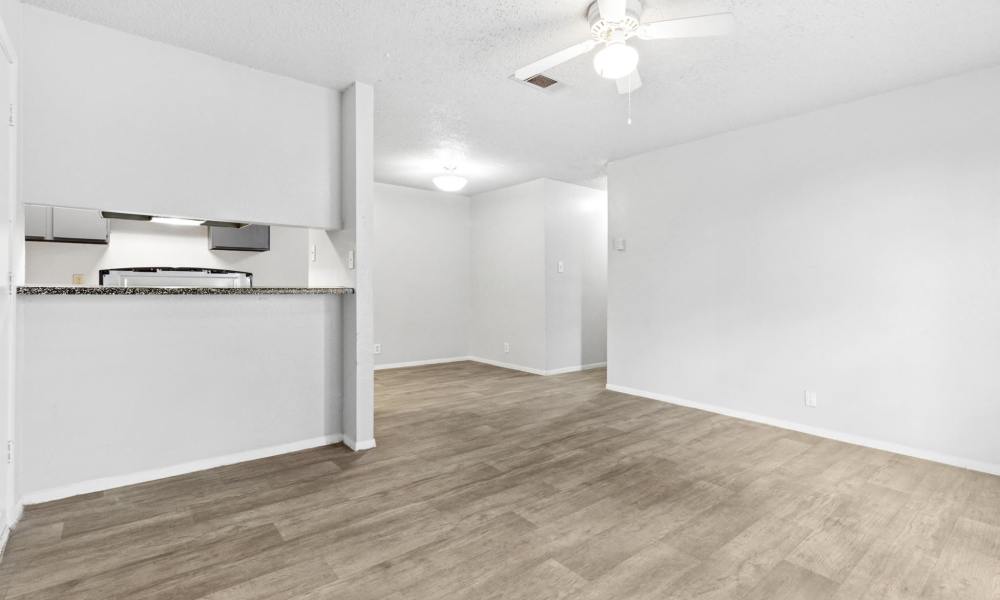 Modern living area with ceiling fan at Arbors of Taylor in Taylor, Texas