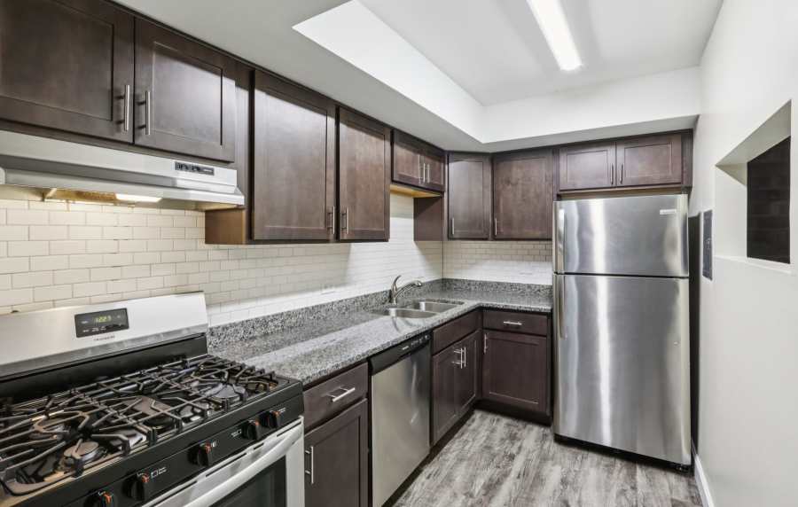Modern kitchen with stainless steel appliances at Crystal Lake Apartments in Crystal Lake, Illinois