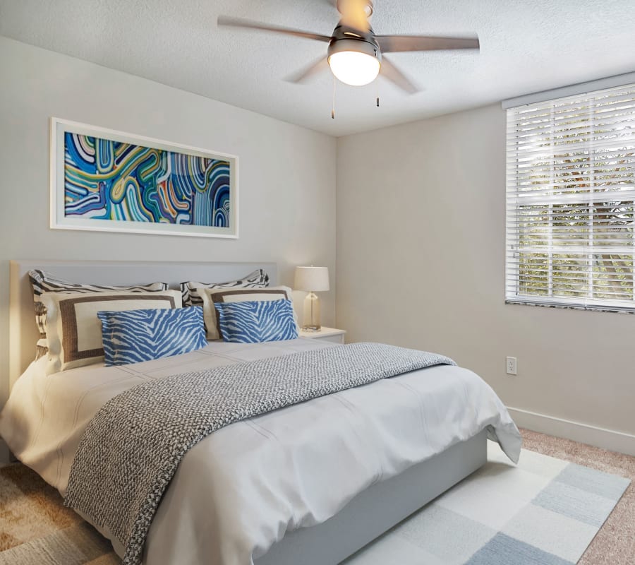 Model guest bedroom at St. Tropez Apartments in Miami Lakes, Florida