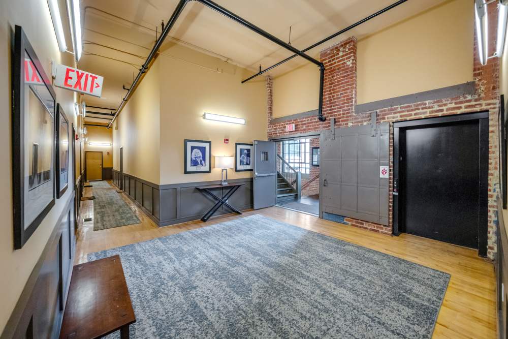 Landing area with seating at The Cotton Mill Lofts in Roanoke, Virginia