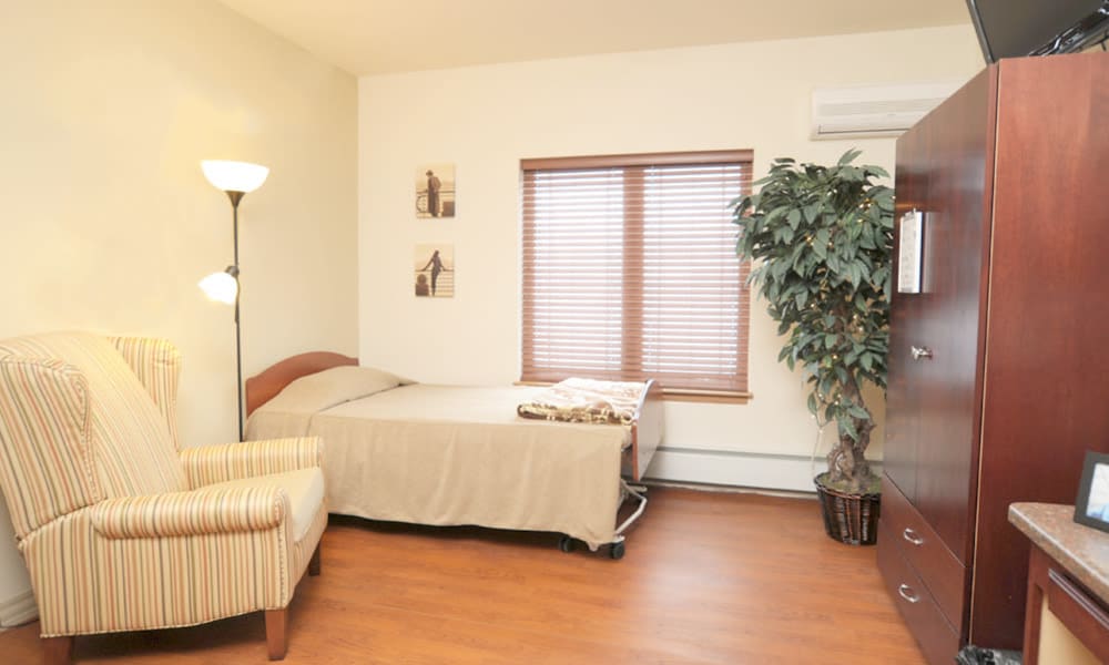 Cozy and comfortable resident suite at Geneva Lake Manor in Lake Geneva, Wisconsin