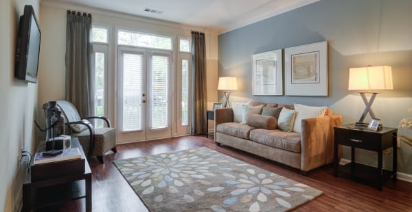 Living room with plank flooring at Berkeley Heights in Atlanta, Georgia
