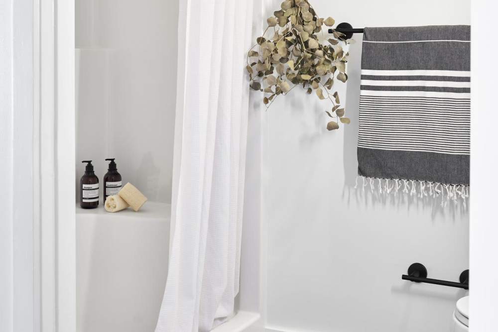 Bathroom with waterfall showerhead at Martin Flats in Nashville, Tennessee
