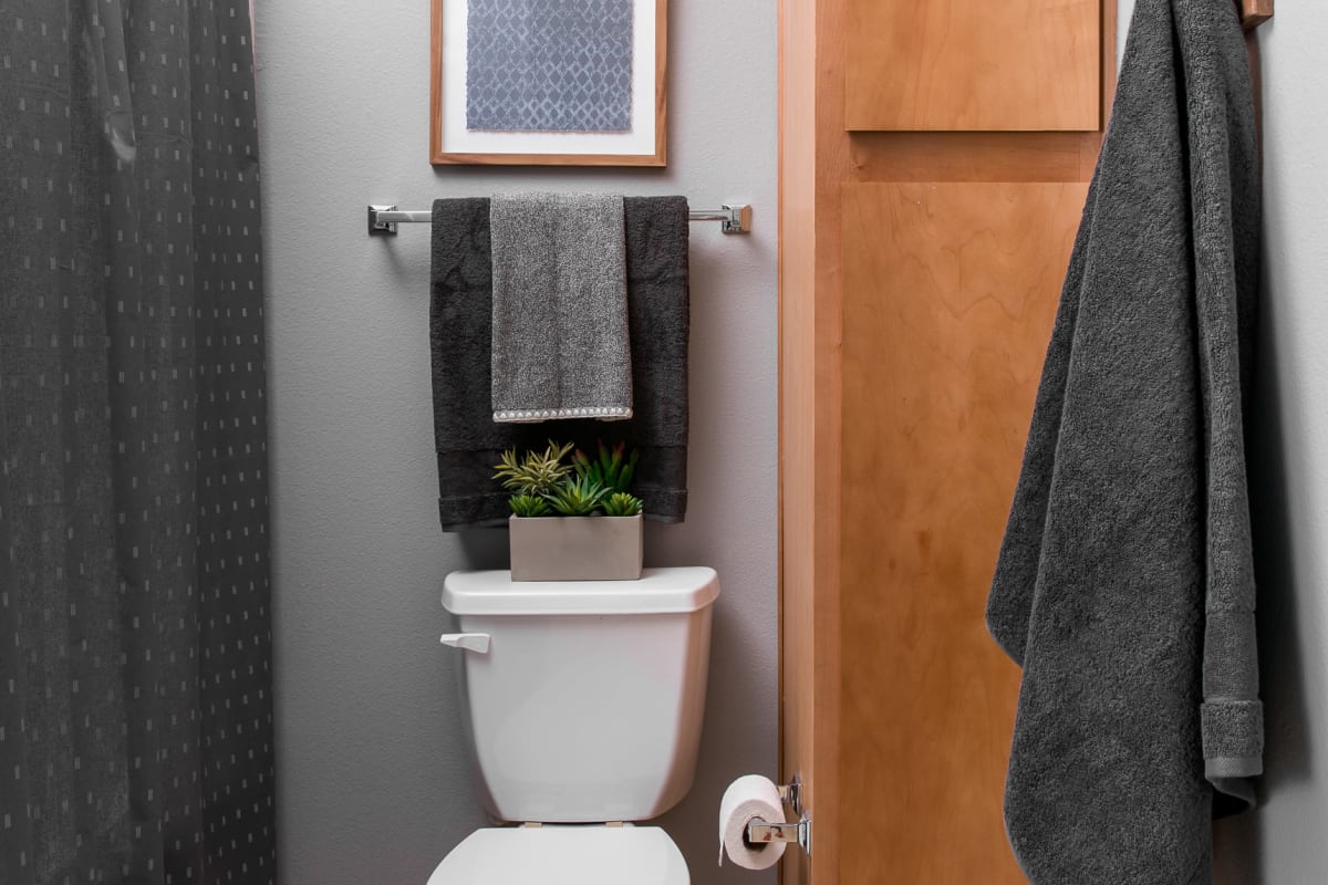 Bathroom with tub/shower combination and ample storage at Hawks Ridge in Iowa City, Iowa