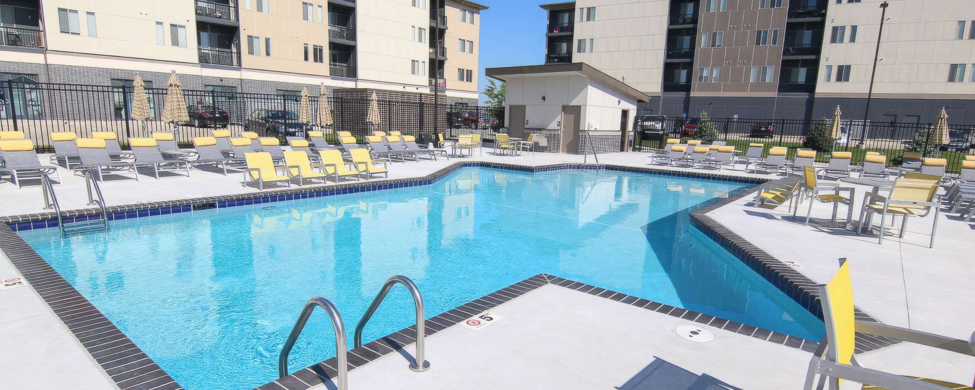 Resort-style swimming pool at ARTISAN Management Group in Des Moines, Iowa