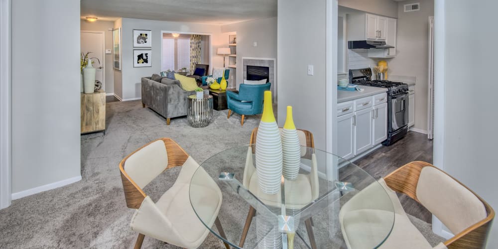 Living room and breakfast nook with modern decor at The Madison in Charlotte, North Carolina
