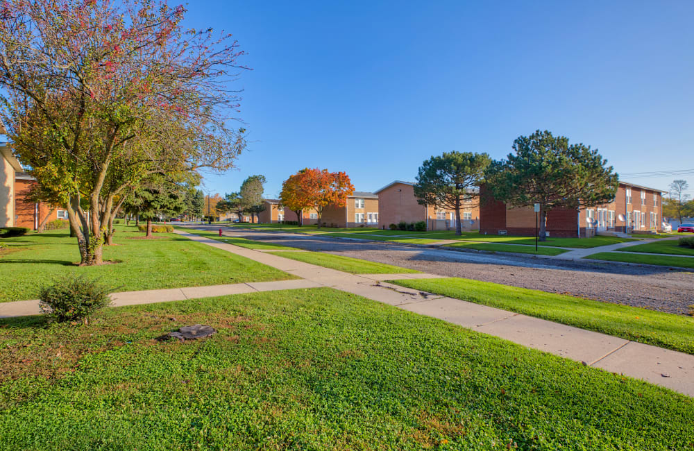 Exterior and lawn at Hebron Townhouse Apartments in Zion, Illinois