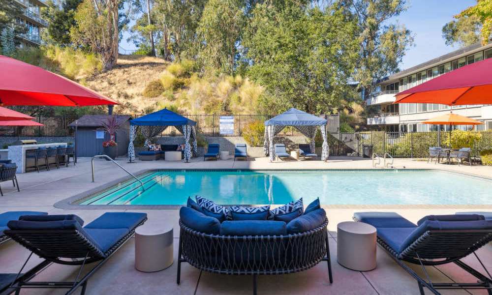 Lounge seating near swimming pool at Belmont Glen Residences in Belmont, California