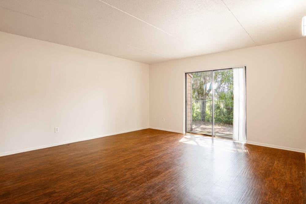 Unfurnished living room at Caroline Arms in Jacksonville, Florida