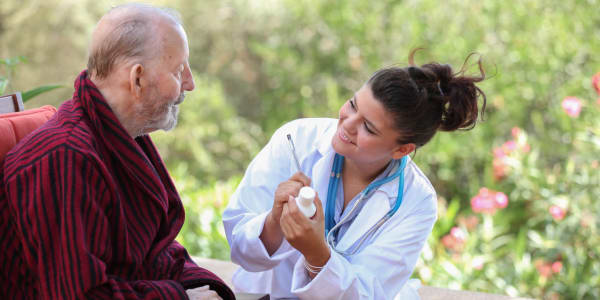 Resident going over medication with their nurse at Geneva Lake Manor in Lake Geneva, Wisconsin