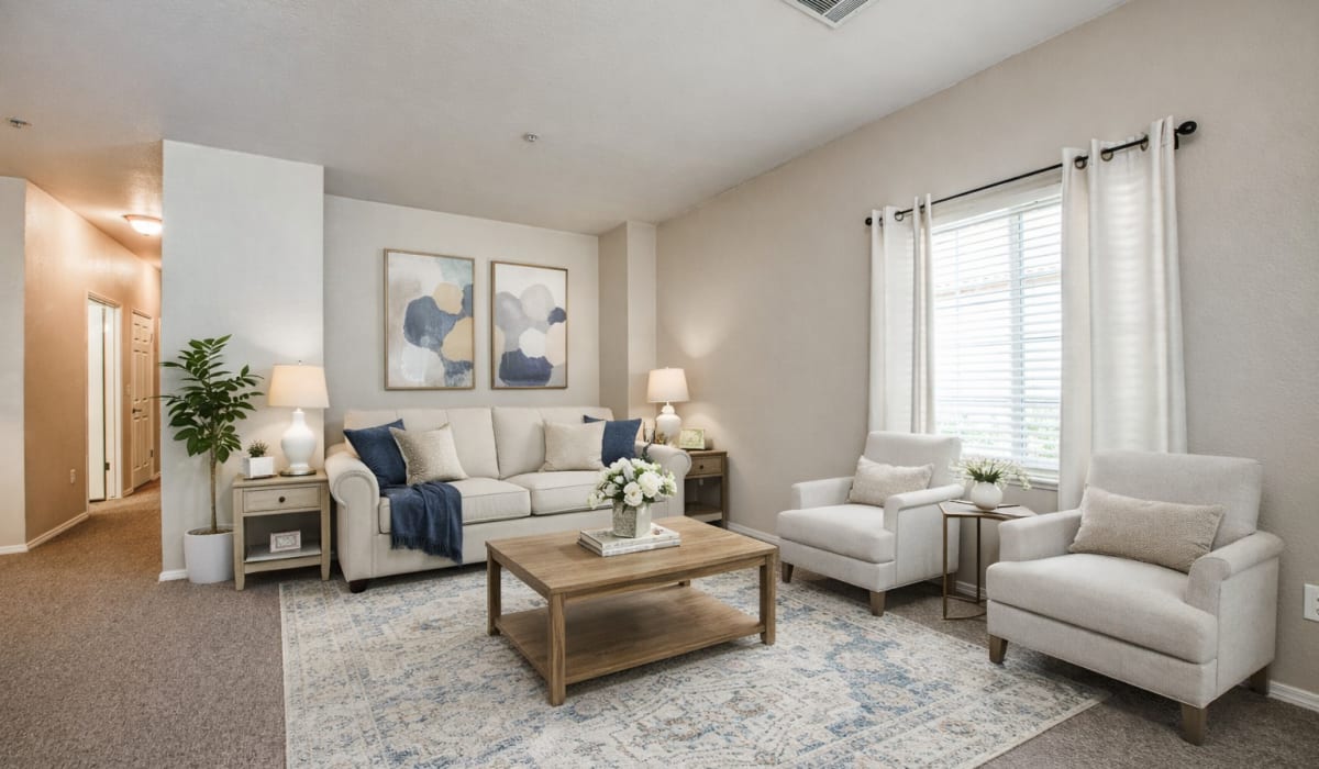 Living room with couch and chairs at Westwood Bluffs in Fresno, California