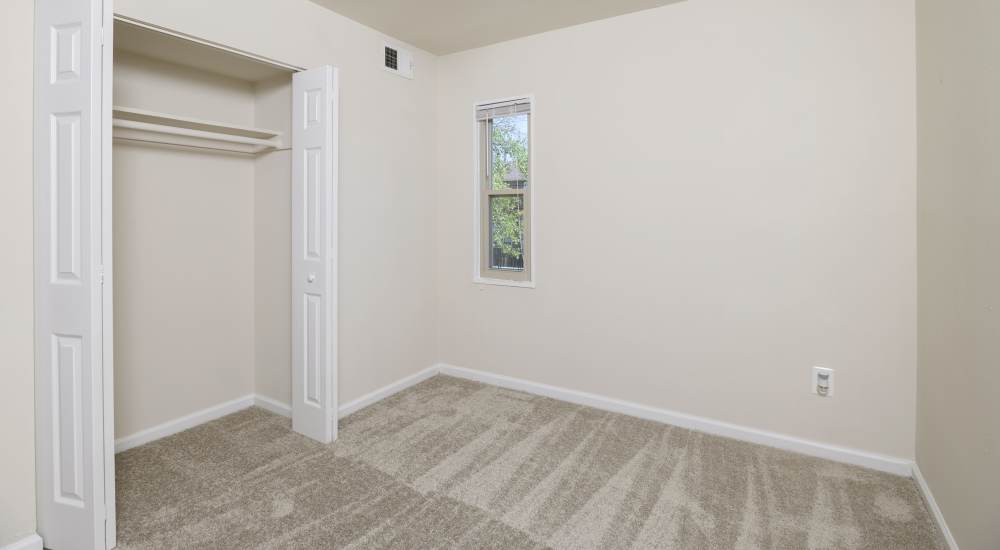 Bedroom with closet at Laurel Manor in Laurel, Maryland