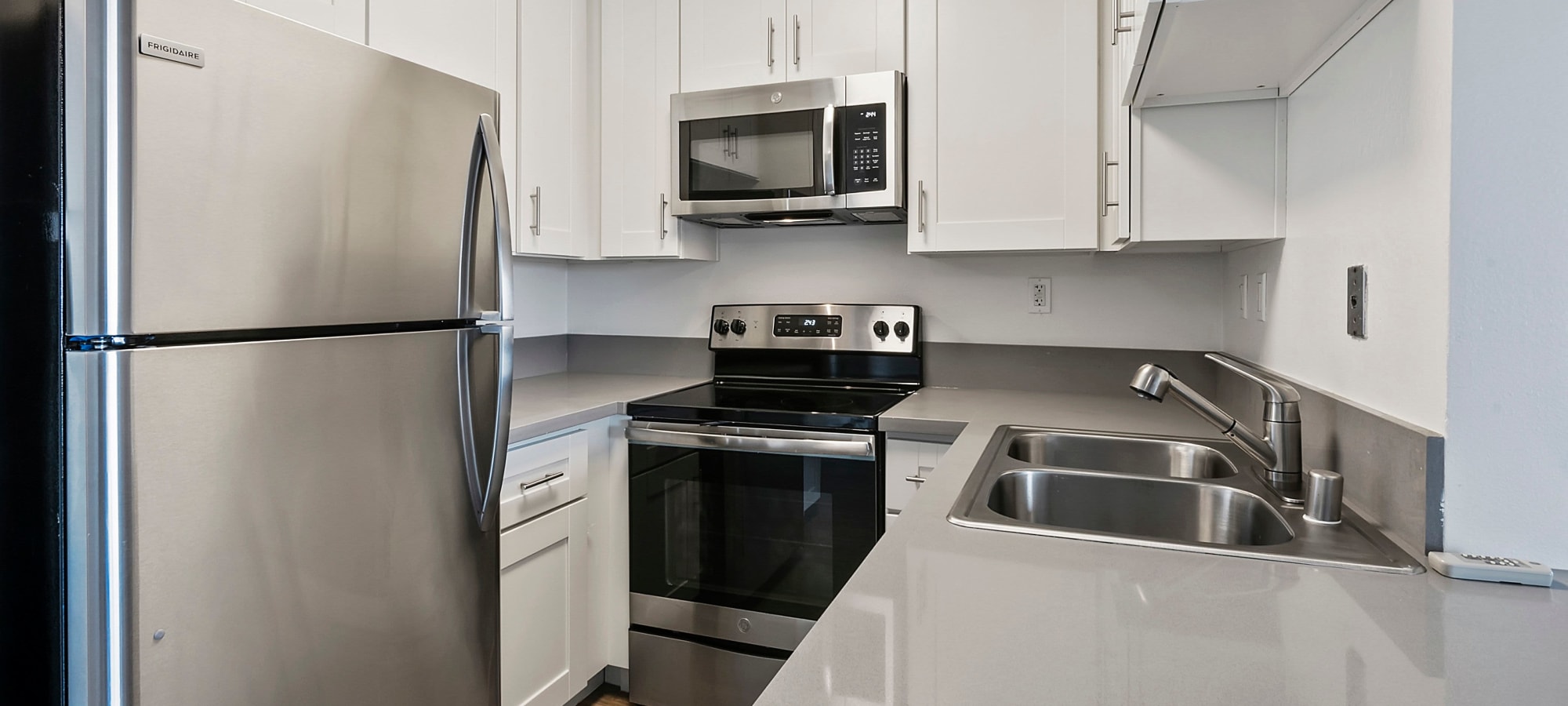 Kitchen with stainless-steal appliances at Villa Bianca, West Hollywood, California