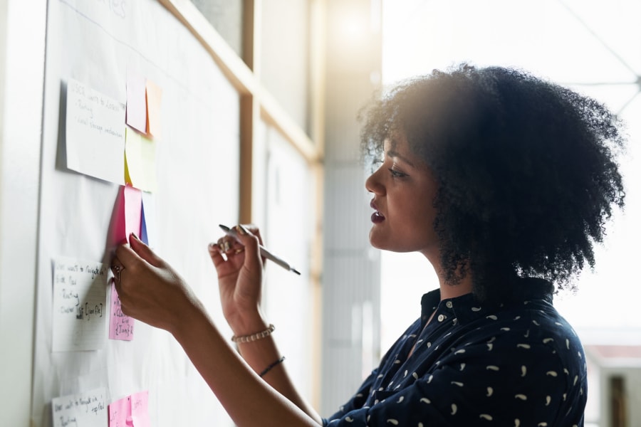 An employee writing notes at Haverkamp Properties