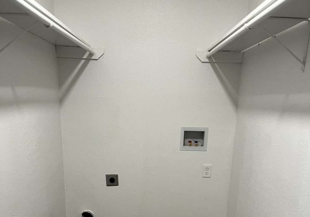 Spacious walk-in closet area at Grapeland Apartments in Grapeland, Texas