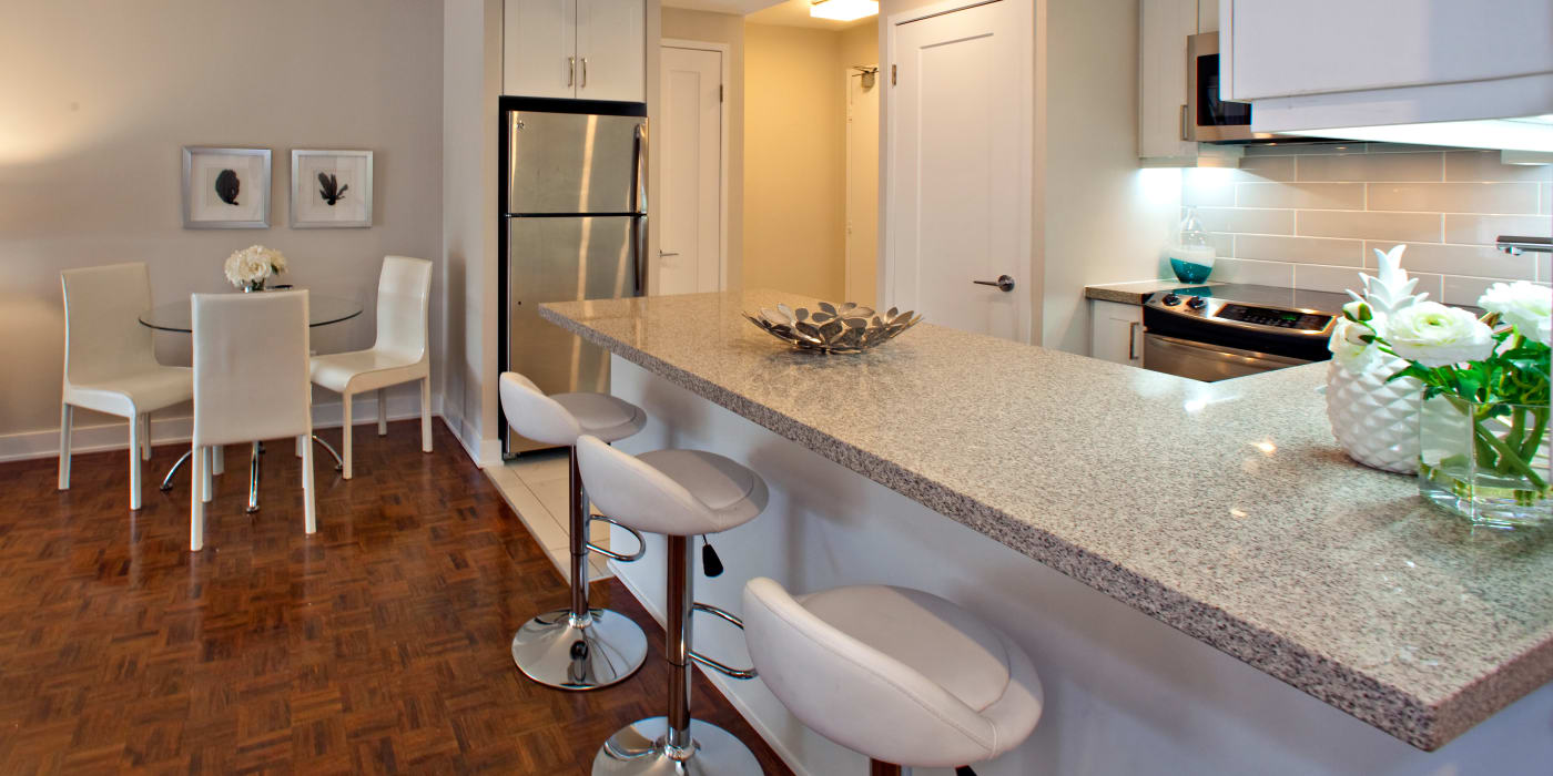 Enjoy a luxury kitchen with breakfast bar at Residences on Bloor