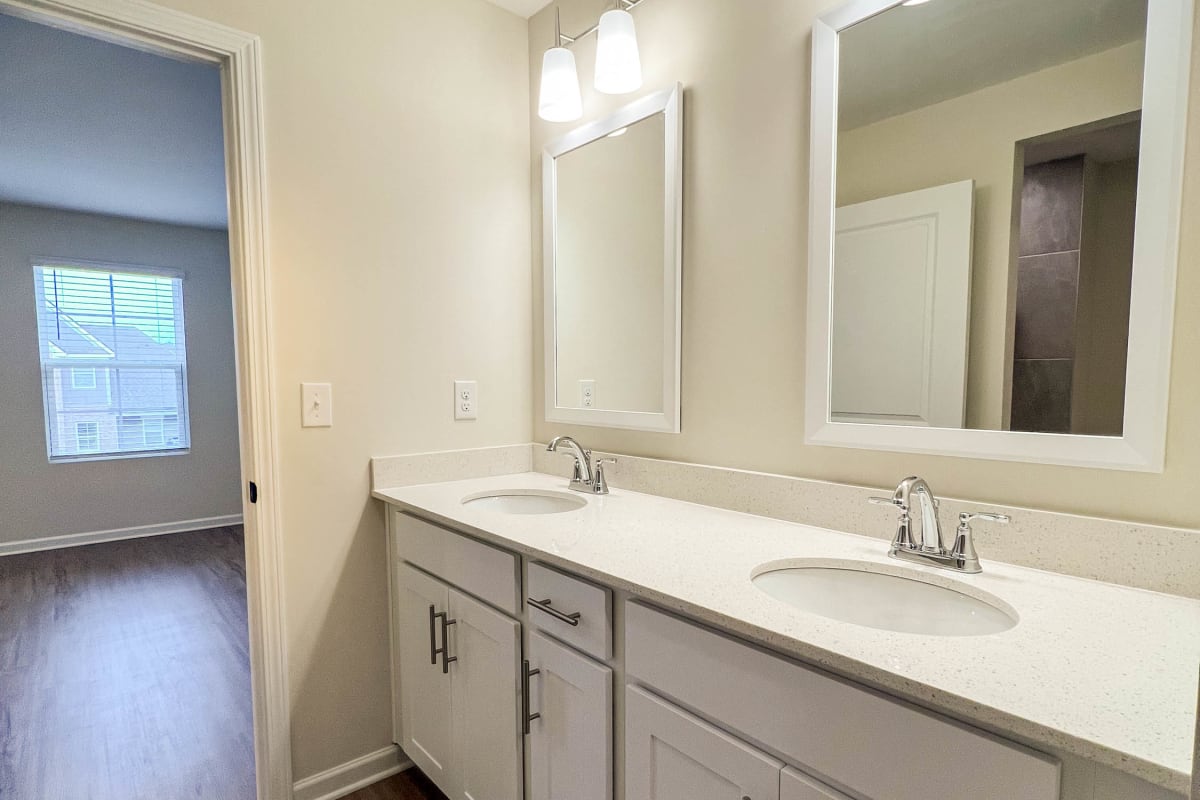 Bathroom with double vanity at Parallel 36 at Legacy in Opelika, Alabama