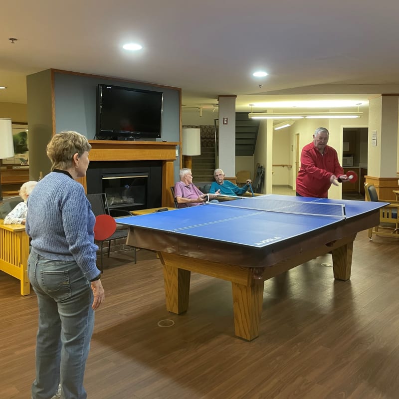Residents playing ping-pong at a Presbyterian Communities of South Carolina community