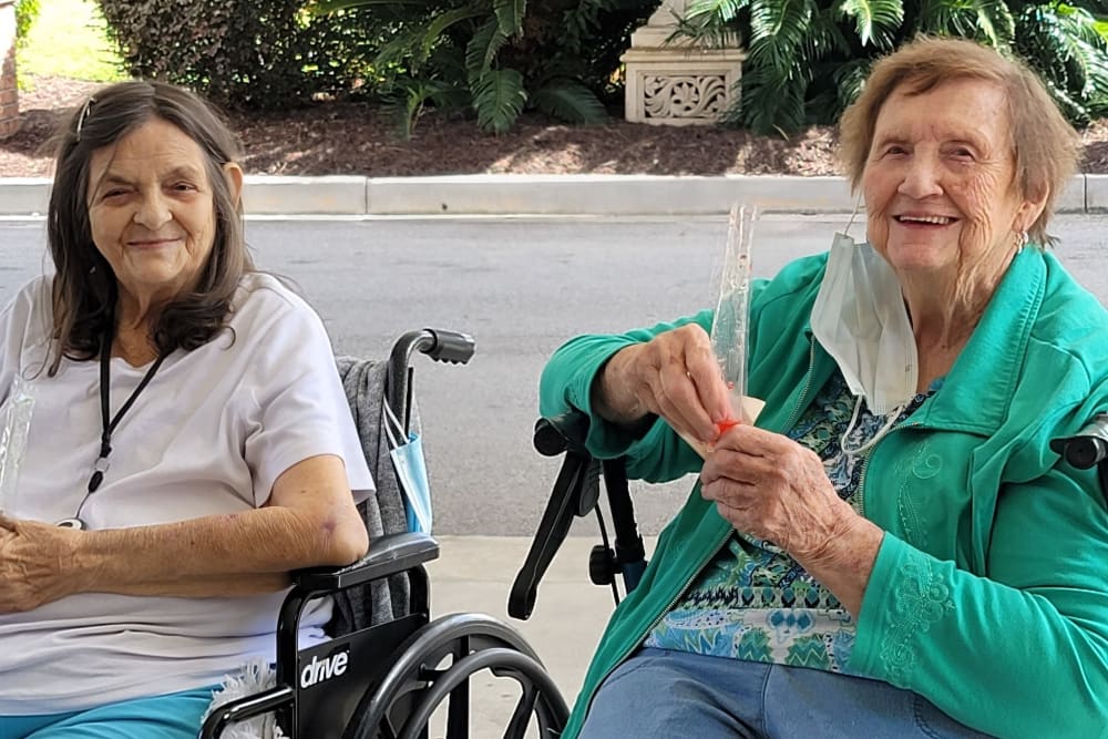 Residents enjoying time outdoors at Carolina Gardens at Lexington in Lexington, South Carolina