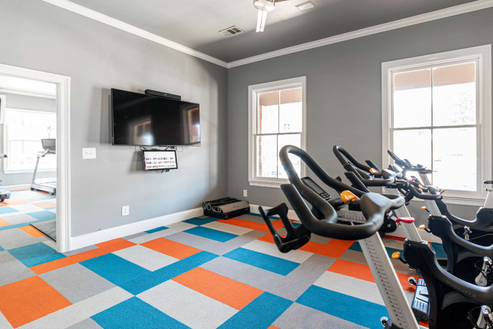 Separate fitness cycle room with tv monitor at Marquis at Bellaire Ranch in Fort Worth, Texas