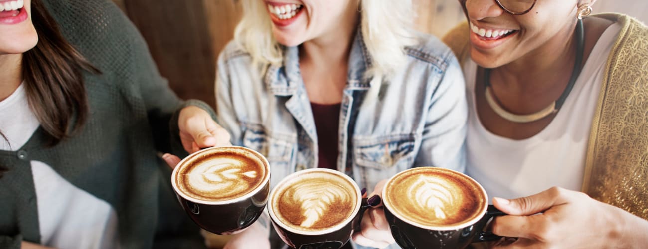 Friends chatting over coffee near Hunterdon Mews in Flemington, New Jersey