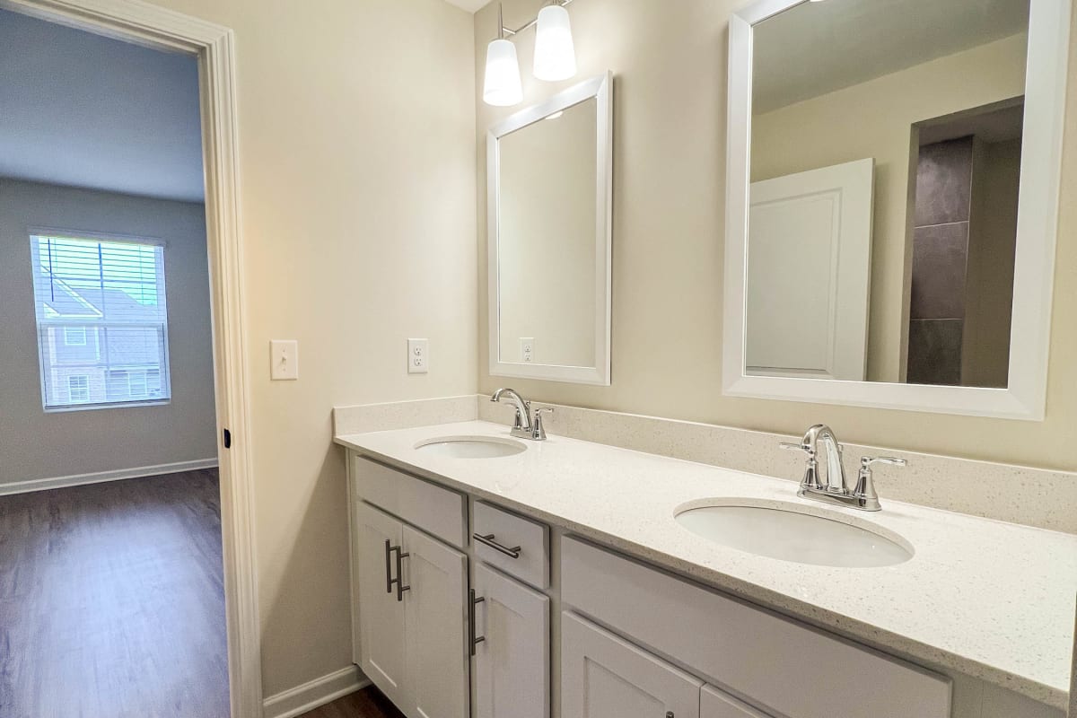 Luxury bathroom with double vanities at Parallel 36 at Legacy in Opelika, Alabama