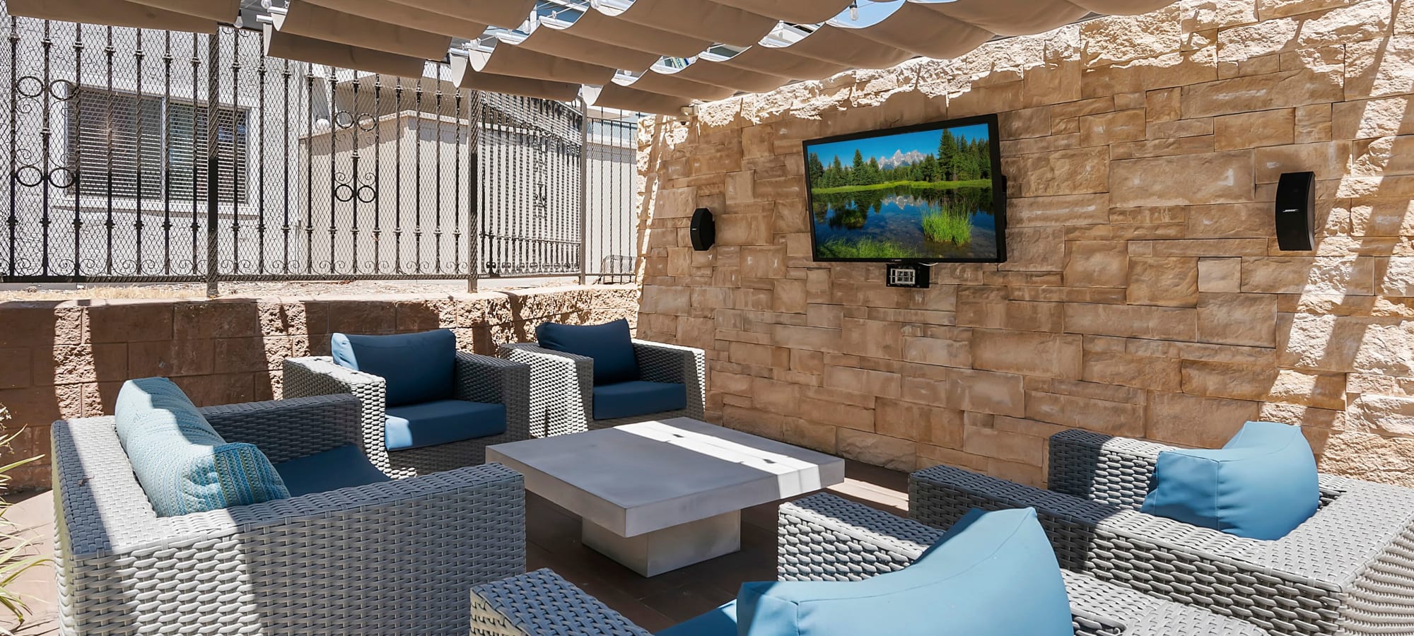 Shaded outdoor lounge area at The Avenue at Carlsbad, Carlsbad, California