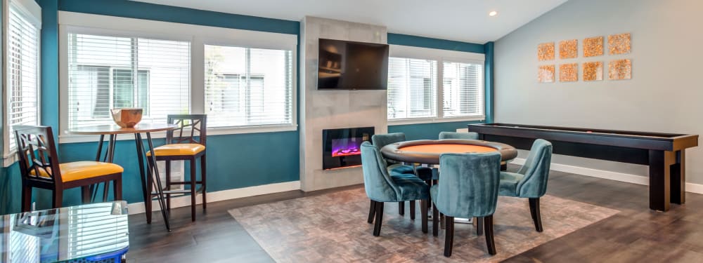 A common area with a card table at Elan 41 Apartments in Seattle, Washington