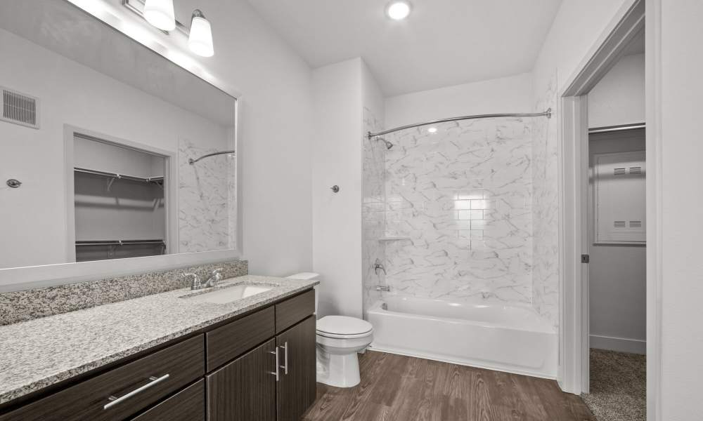 Bathroom with shower and tub at Brook Hollow in Wichita Falls, Texas