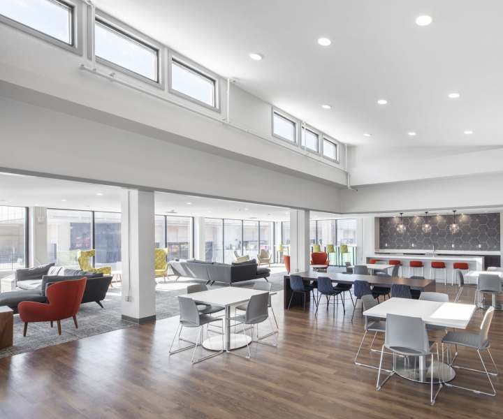 Spacious modern lounge with varied seating at Skyview Downtown in Springfield, Massachusetts